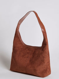 Minimalistyczna torebka hobo z zamszowym wykończeniem