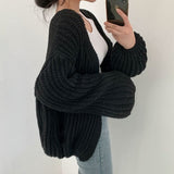 Sweter damski z grubym splotem i otwartym przodem
