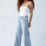 Damskie jeansy wide leg z naszywkami w kształcie serca