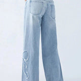 Damskie jeansy wide leg z naszywkami w kształcie serca