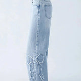Damskie jeansy wide leg z naszywkami w kształcie serca