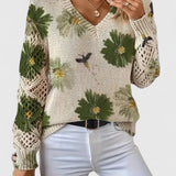 Sweter damski w kwiaty z dekoltem w serek