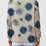 Sweter damski w kwiaty z dekoltem w serek