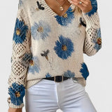 Sweter damski w kwiaty z dekoltem w serek