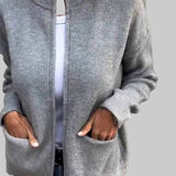 Sweter damski dzianinowy z zamkiem i kieszeniami