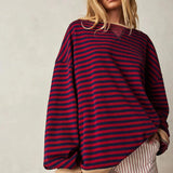 Sweter damski w paski o luźnym kroju
